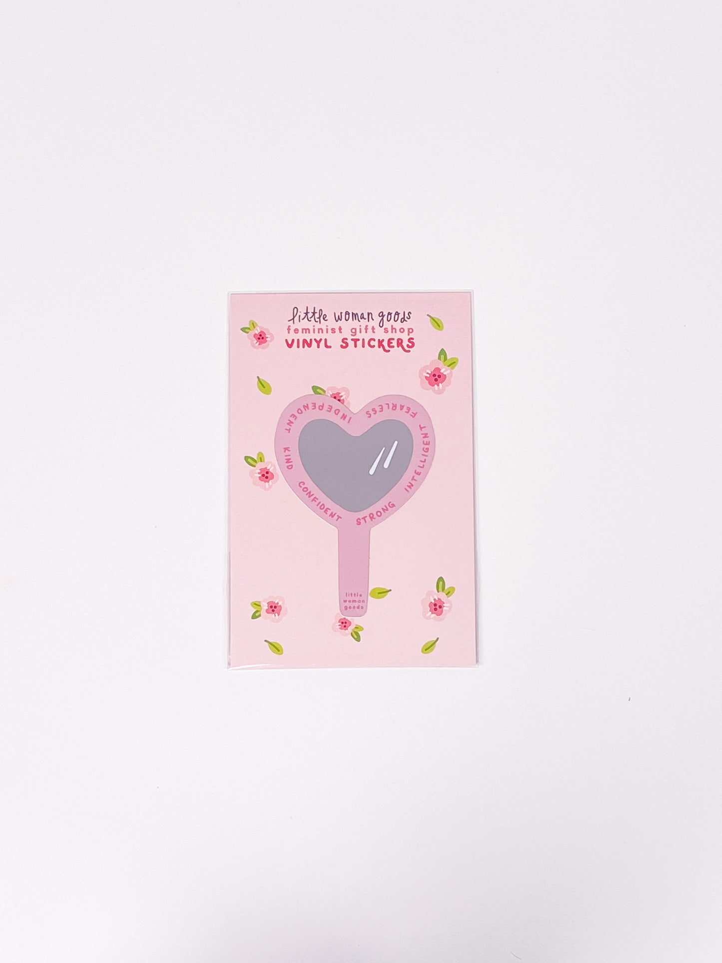 Zoomed out of our light pink heart shaped mirror positive affirmation vinyl sticker 